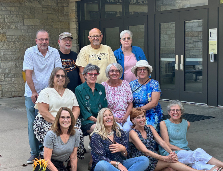 Photo of Class of 1975 taking a tour of the new science labs and fieldhouse.