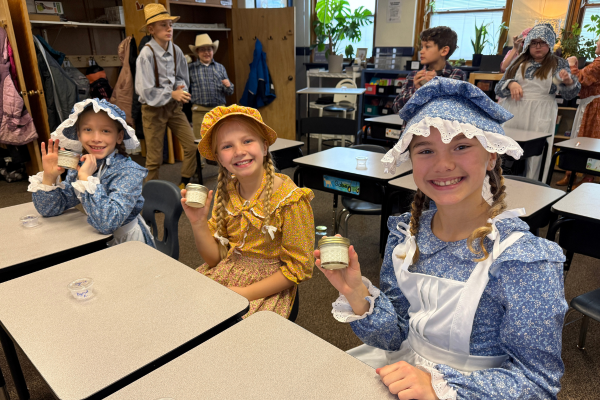 4th Grade students dressed in pioneer attire at Our Lady of Peace Intermediate School's Pioneer Day.